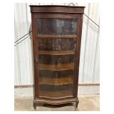 Antique tiger oak curved front glass & claw feet