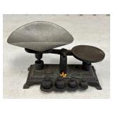 Miniature black cast iron balance scale w/silver