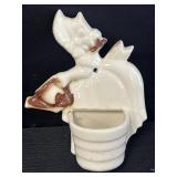 Vtg. ceramic wall pocket planter of girl w/