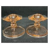 (2) pink depression glass candlestick holders