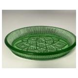 green glass trinket dish w/ geometric cut pattern