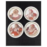 Set of 4 varied Coca-Cola Santa metal tin coasters