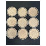 (9) metal and glass coasters with design in middle