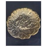 Gold toned metal plate w/ leaf design