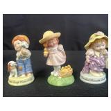 Avon porcelain figurines 'Cherished moments'