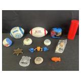 Variety of small toys including mini footballs,