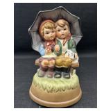Hummel Style Children Under Umbrella Music Box