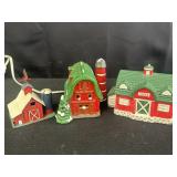 Variety of red barn Christmas decor w/ tin