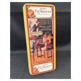 Reproduction of a Vtg Fig Newtons tin featuring