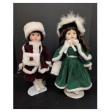 (2) Christmas Dolls w/ red & green velvet dresses