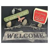 Variety of decorative signs - welcome, a garden