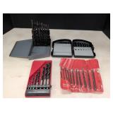 (4) sets of Drill bits in cases