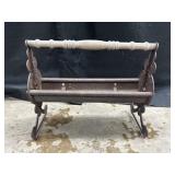 Antique cast-iron newspaper log roller