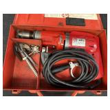 Red Head 606-3 hammer drill in metal case.