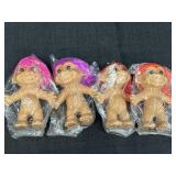 4 Russ 5in trolls, each w/different hair color &