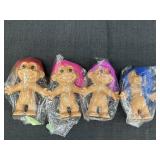 4 Russ 5in trolls, each w/different hair color &