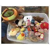 Variety of plush toys in Sterilite tote - turtle