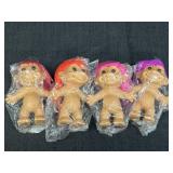 4 Russ 5in trolls, each w/different hair color &