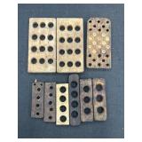 Black powder ball holders
