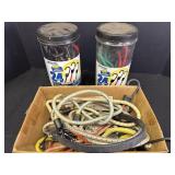 Variety of bungee cords, containers are not full.