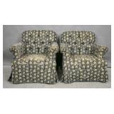 Pair of upholstered swivel club chairs Pair of upholstered swivel club chairs