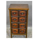 Stained wood apothecary cabinet