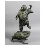 Asian bronze figure of man on frog Asian bronze figure of man on frog