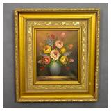 Framed still life of flowers in a blue vase Framed still life of flowers in a blue vase