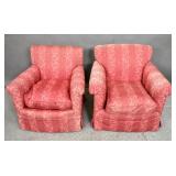 Red floral upholstered armchairs