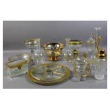 Set of 8 Baccarat crystal & gilt-decorated plates;