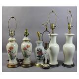Group of 6 cream ground porcelain lamps Group of 6 cream ground porcelain lamps