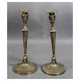 Pair of sterling silver weighted candlesticks Pair of sterling silver weighted candlesticks