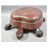 Tufted upholstered turtle-form stool