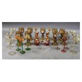 Group of 24 enamel-decorated aperatif glasses;