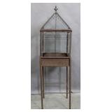 Painted metal and glass aviary