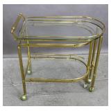Brass and glass swinging shelf bar cart