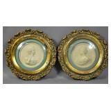 Pair of plaster cameo portraits