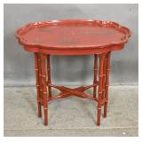 Asian style red laquer tray on stand