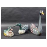 3 Carved wood ducks