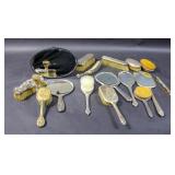 Group of sterling silver handled vanity articles;