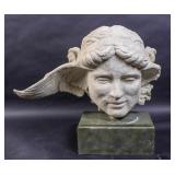 Composition winged head