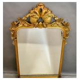 Rococo style giltwood mirror