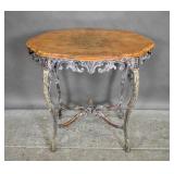 Carved and painted wood center table