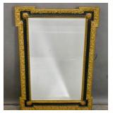 Black painted and gilt framed mirror
