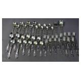 Assembled set of sterling silver flatware