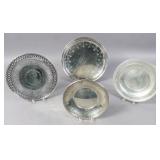 4 sterling silver circular dishes