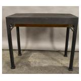 Steel table with bracketed legs