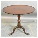 Mahogany round tilt-top table