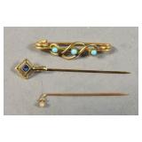 14 karat gold stick pin;