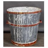 Iron bound galvanized metal barrel